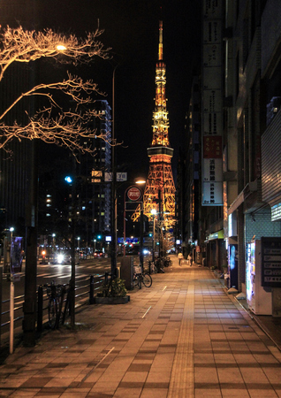 Side view of Tokyo Tower with illumination on dark sky background.のeditorial素材