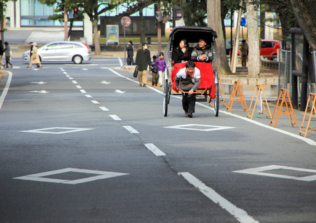 japanese rickshaw with a cart on the road. Nara, Japanのeditorial素材