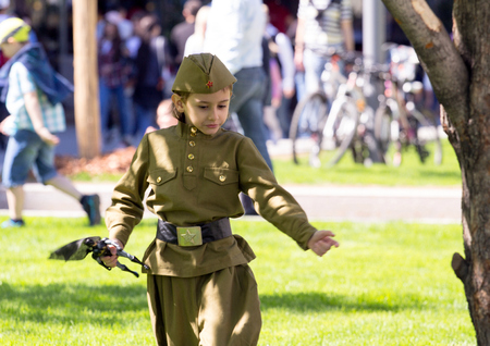 2018.09.05, Moscow, Russia. Victory Day in Moscow. A boy wearing military uniform on parade of...