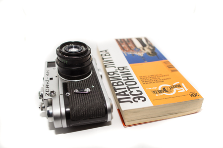 Retro photo camera and guidebookのeditorial素材