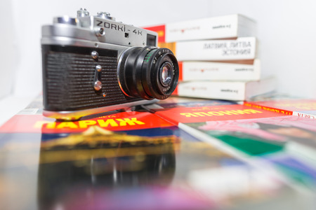 Retro photo camera and guidebooksのeditorial素材