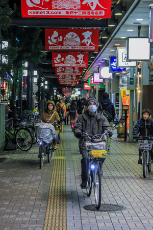 2013.01.01, Tokyo, Russia. Tourists and locals on the street. People of Tokyo. Travel around of Japan.のeditorial素材