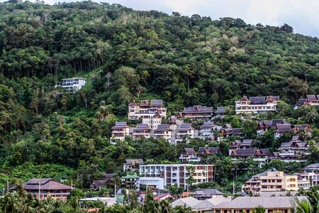 Landscape of the village on the hillside. Travel around Thailand. Architecture of Thailand, blur and grain effect.の写真素材