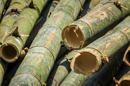 a pile of bamboo stems for furnitureの写真素材