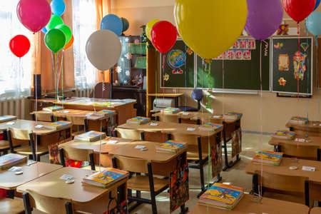 09/01/2015, Maloyaroslavets, Russia. classroom decorated for September 1st: colorful balloons over the desks.のeditorial素材