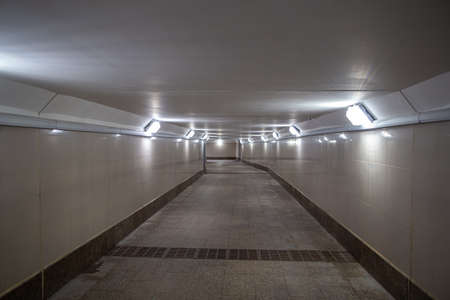 Perspective of the interior of the underpass. Moscow cityscape.
