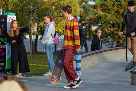 09/27/2020, Moscow, Russia.A teenager boy holding his skateboard on rollerdrome. Active lifestyle of modern Russian children.のeditorial素材