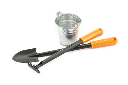 rake, shovel, bucket isolated on white backgroundの写真素材