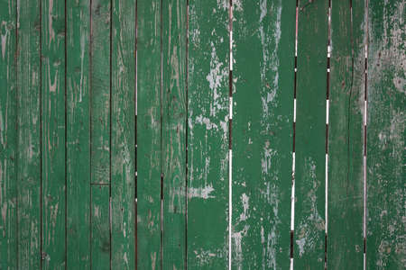 old green wooden fence backgroundの写真素材