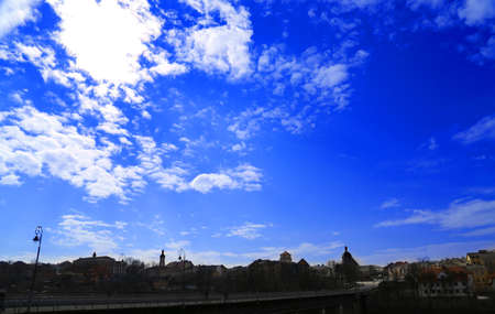 blue sky with clouds silhouette of cityの写真素材