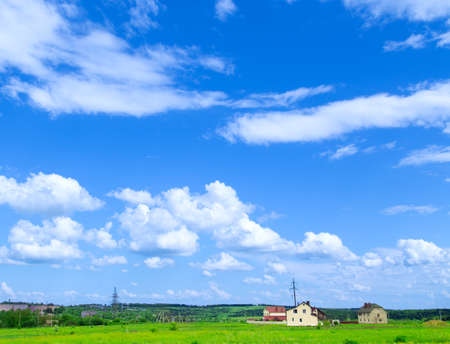 settlement on the horizon, blue skyの写真素材