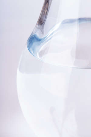 glass carafe isolated on white backgroundの写真素材