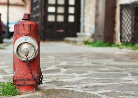 old hydrant on the street pavingの写真素材