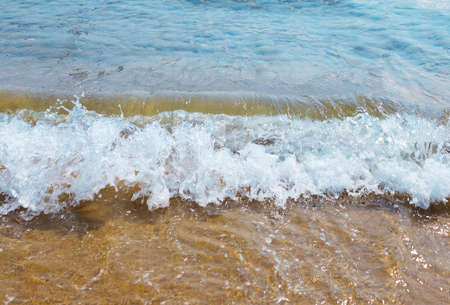 sandy beach, sea shore with waves