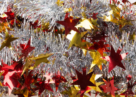 Tinsel silver with red starsの写真素材