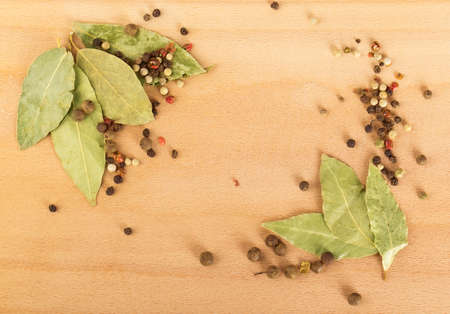 bay leaf, pepper on a wooden backgroundの写真素材