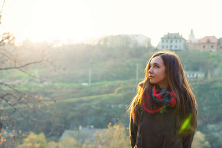 autumn woman in the parkの写真素材