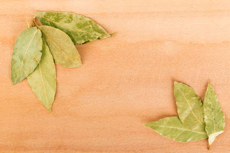 bay leaf, pepper on a wooden backgroundの写真素材