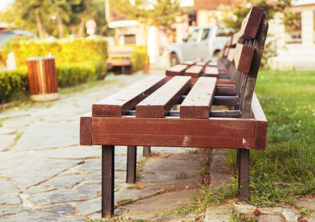 grass park bench day backgroundの写真素材