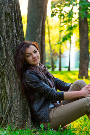 girl in the park sunny portraitの写真素材