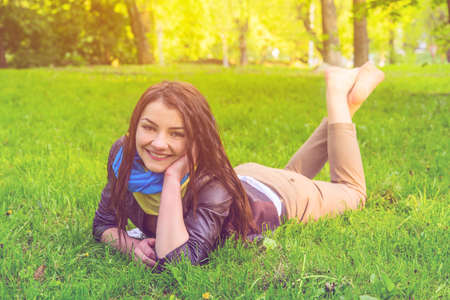 beautiful sunny portrait of a girl Face laughingの写真素材