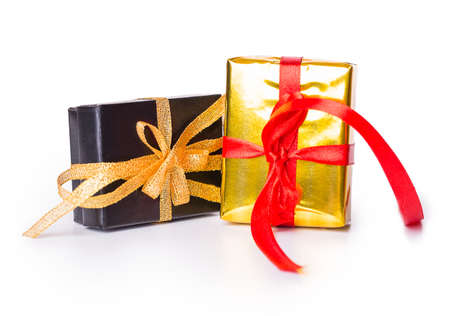 Two gift box bow red yellow black Isolated on white backgroundの写真素材