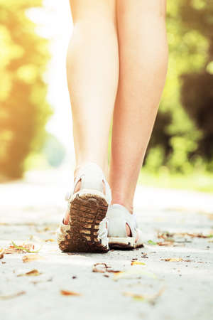 female legs road outside dayの写真素材