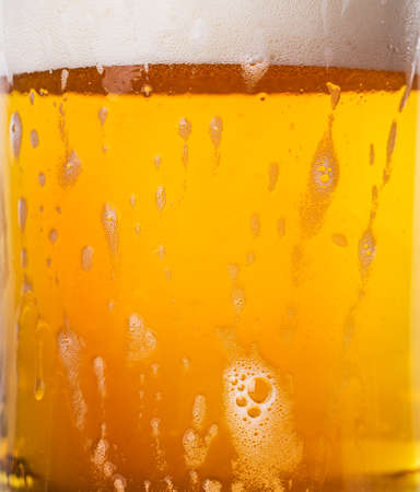 glass of beer foam Isolated on white backgroundの写真素材