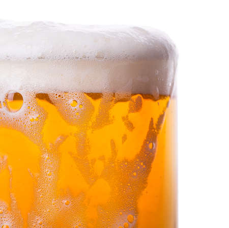 glass of beer foam Isolated on white backgroundの写真素材