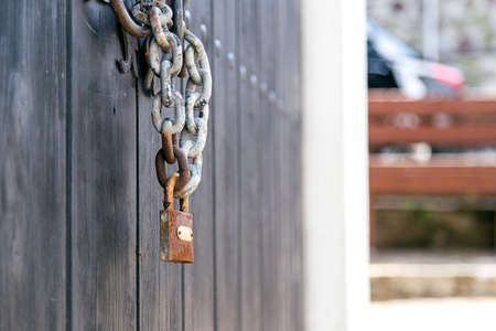 wooden door padlock security protection hackingの写真素材