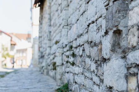 gray stone wall outside streetの写真素材