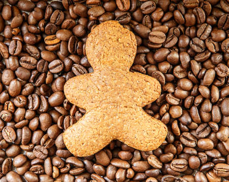 biscuit man on roasted coffee beans