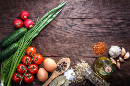 still life tomato cucumber green onion  wooden background