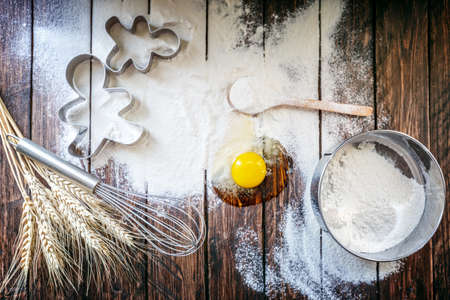 flour, egg board spikelets of wheat on a wooden board