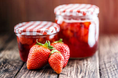 Strawberry jam on a wooden backgroundの写真素材