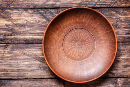 empty bowl on a wooden backgroundの写真素材