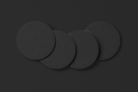 Black coasters. Isolated on black background. Include clipping path. 3d renderの写真素材