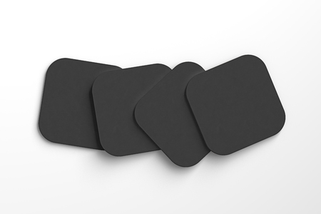 Black coasters. Isolated on white background. 3d renderの写真素材