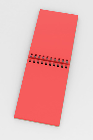 Red spiral notepad isolated on white background. Include clipping path of the border of notepad. 3d renderの写真素材