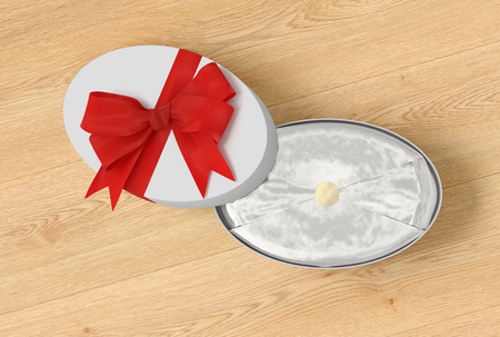 White open oval gift box with red bow on wooden background. 3d renderの写真素材