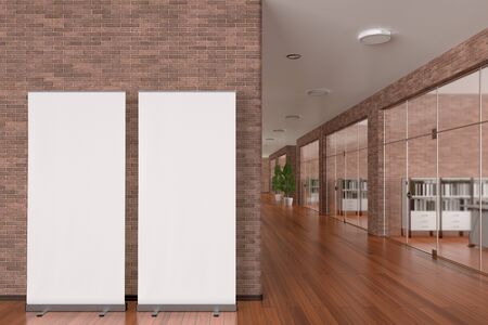 Two blank roll up banner stands in office interior with clipping path around ad stand. 3d...
