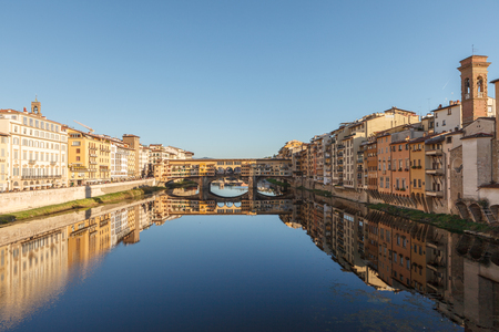 View of bridge Ponte Vecchio and the Arno River from the Ponte Santa Trinita in Florence, Tuscany, Italy. の写真素材