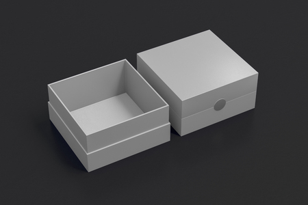 Two gold square boxes opened and closed on black background. 3d illustrationの写真素材