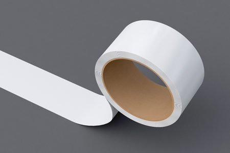 White insulating tape roll on gray background. 3d illustration.の写真素材