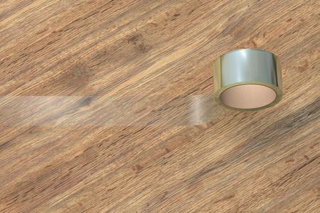 Transparent adhesive tape roll on wooden background. 3d illustration.の写真素材