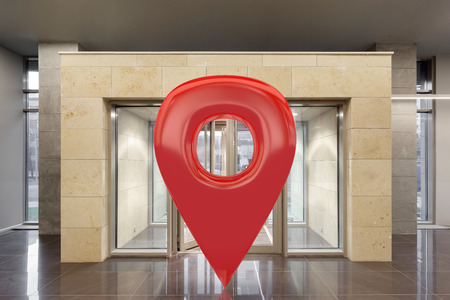 GPS pin location navigation geo tag in entrance of modern business office. 3d illustrationの写真素材