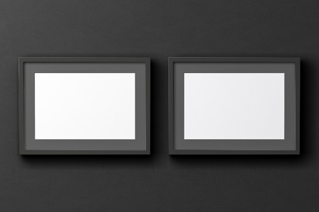 Blank two horizontal posters on the black wall with dark frame  around poster. 3d illustrationの写真素材