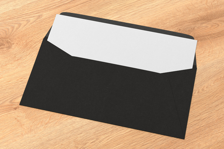 Black blank envelope with blank letter inside on wooden background. 3d renderの写真素材