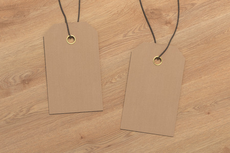 Two blank craft paper price tag label mockup on wooden background. 3d illustrationの写真素材