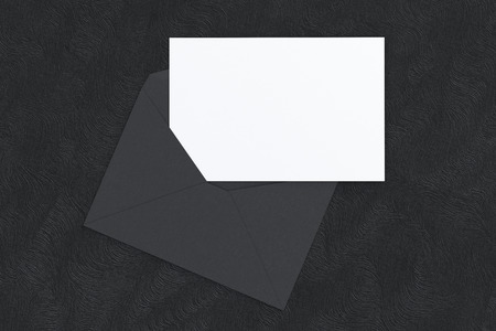 Black  blank envelope with blank letter inside on black background. 3d render